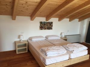 Postel nebo postele na pokoji v ubytování Resort Drena