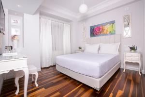Postel nebo postele na pokoji v ubytování Ascot Hotel Büyükada + 37 fotografií