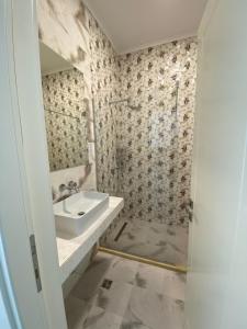 Ванна кімната в Hotel DNH