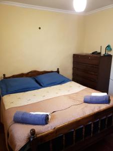 Uma cama ou camas num quarto em Guest House Nanu