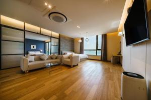 TV a/nebo společenská místnost v ubytování Brown Dot Hotel Ulsan Jangsaengpo