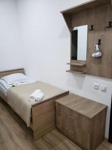 Uma cama ou camas num quarto em Guest House Nanu