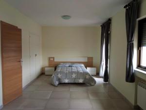Posteľ alebo postele v izbe v ubytovaní La Villa Hostal