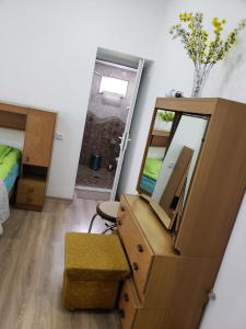 Uma cama ou camas num quarto em Guest House Nanu