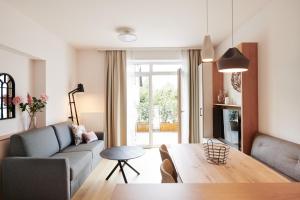 Posezení v ubytování HOMEBOUND APARTMENTS Salzburg City I - contactless check-in
