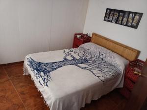 Katil atau katil-katil dalam bilik di Apartamento Turístico MURALLA DE CÁCERES