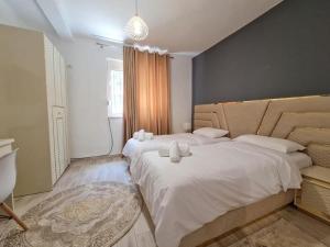 Postel nebo postele na pokoji v ubytování Home Center