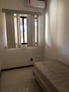 Postel nebo postele na pokoji v ubytování Guarajuba - BA - Confortável casa com 3 quartos, 2 suites