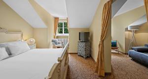 Postel nebo postele na pokoji v ubytování Hotel St Leonhard + 26 fotografií