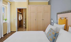Postel nebo postele na pokoji v ubytování Hotel St Leonhard