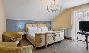 TV a/nebo společenská místnost v ubytování Hotel St Leonhard