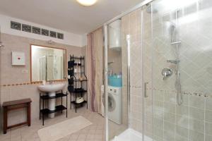 a bathroom with a shower and a sink and a shower at Lucky Holidays in Rome +45 photos