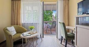 TV a/nebo společenská místnost v ubytování Hotel St Leonhard