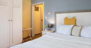 Postel nebo postele na pokoji v ubytování Hotel St Leonhard