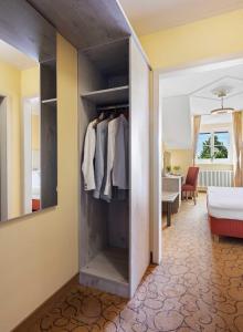 Postel nebo postele na pokoji v ubytování Hotel St Leonhard