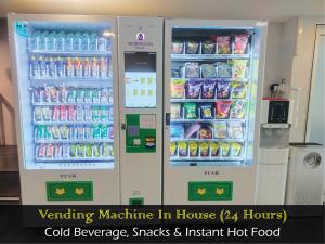 a vending machine in a house with drinks and food at Merrinton Hotel Temerloh in Temerloh