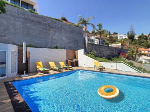 The swimming pool at or close to Viela Vie by LovelyStay
