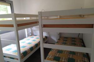 Katil dua tingkat atau katil-katil dua tingkat dalam bilik di villa Bouillat d'Anty