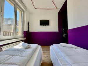 Postel nebo postele na pokoji v ubytování Hotello Hostel + 25 fotografií