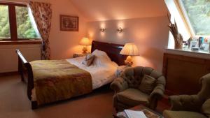 Ein Bett oder Betten in einem Zimmer der Unterkunft Dalmunach House