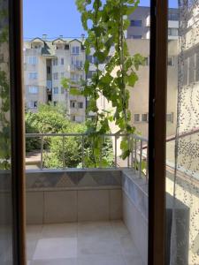 a balcony with a view of a building at Kussmann Appartment in Varna City
