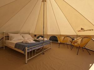 Postel nebo postele na pokoji v ubytování Unique Glamping Suite
