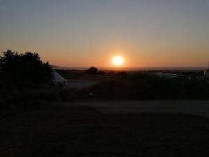 Východ nebo západ slunce při pohledu z luxury tent nebo okolí