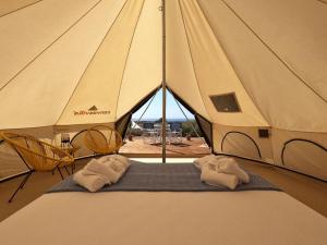 Postel nebo postele na pokoji v ubytování Unique Glamping Suite