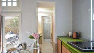 A kitchen or kitchenette at Corte dei Greci
