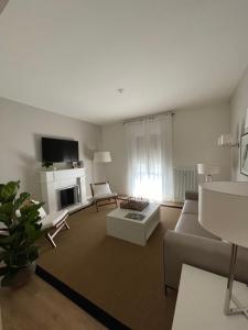 A bed or beds in a room at Magnifica Vittorio Veneto