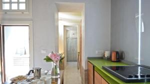 A kitchen or kitchenette at Corte dei Greci