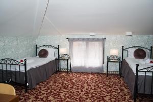 Postel nebo postele na pokoji v ubytování Appelberg hotel
