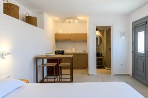 Posteľ alebo postele v izbe v ubytovaní Landi House Mykonos