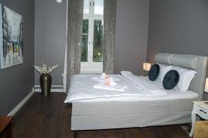 Postel nebo postele na pokoji v ubytování Appelberg hotel