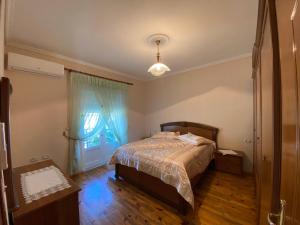 Postel nebo postele na pokoji v ubytování Green Villa