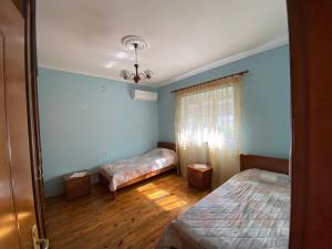 Postel nebo postele na pokoji v ubytování Green Villa