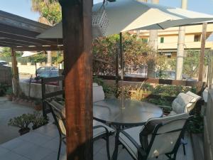 Photo de la galerie de l'établissement Yhomisus sul mar- Villetta singola, à Punta Braccetto