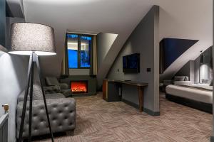 Телевизор и/или развлекательный центр в Trendlife Hotels Uludağ ALL INCLUSIVE