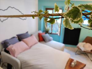Appartement Hyper Centre Evian - Leman Odyssey tesisinde bir odada yatak veya yataklar