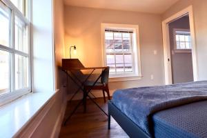 Cama o camas de una habitación en The Fairfax Suite at Prince Street Inn