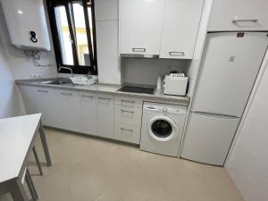 Kuchyň nebo kuchyňský kout v ubytování Royal Suites Estepona by Croma