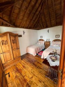 מיטה או מיטות בחדר ב-Casa Morera