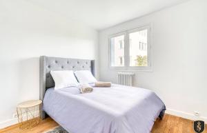 Katil atau katil-katil dalam bilik di Grande maison 160 m2 6 chambres à Caen +1 gambar