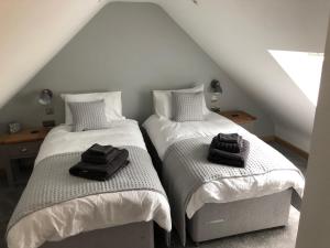 Säng eller sängar i ett rum på Newly Converted Luxury Barn With Private Hot Tub