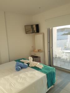 Imagen de la galería de Christopher's Sandy Beach Suites, en Ayia Napa