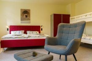 Postel nebo postele na pokoji v ubytování Hotel und Hostel Gleisbett