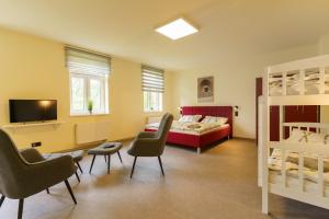 TV a/nebo společenská místnost v ubytování Hotel und Hostel Gleisbett