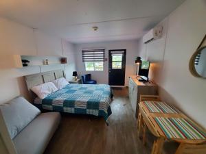 Uma cama ou camas num quarto em Parc Octopus