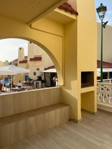 Televízia a/alebo spoločenská miestnosť v ubytovaní Luxury Apartment fronte piscina Mareverde A&V Costa Adeje