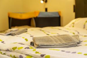 Postel nebo postele na pokoji v ubytování Hotel und Hostel Gleisbett